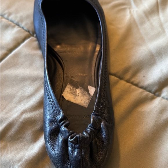 Tory Burch Black Flats with Gold Medallion - Picture 4 of 5